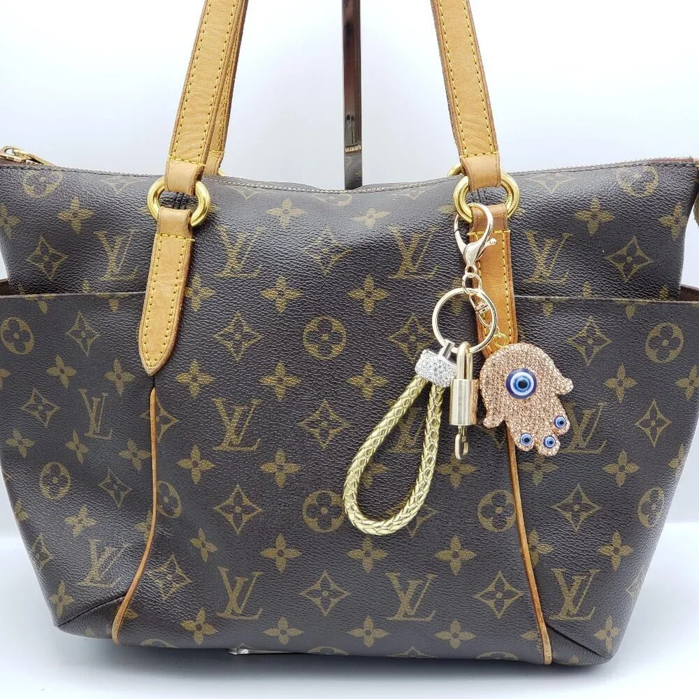 Authentic Louis Vuitton Lock & Key with unbranded Evil Eye Bagcharm 011526
